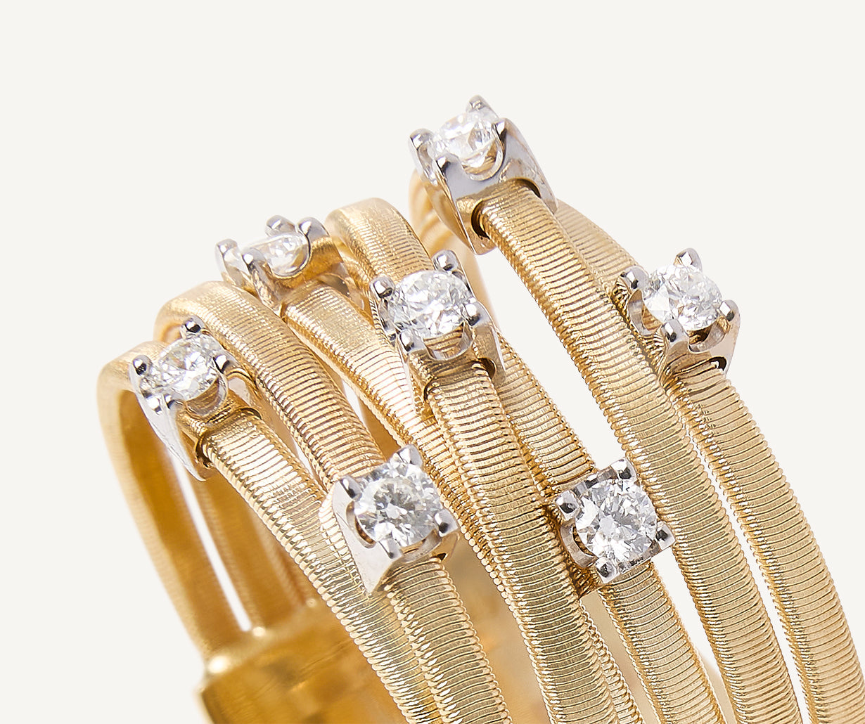 Seven-band yellow gold ring with prong-set diamonds – Marco Bicego