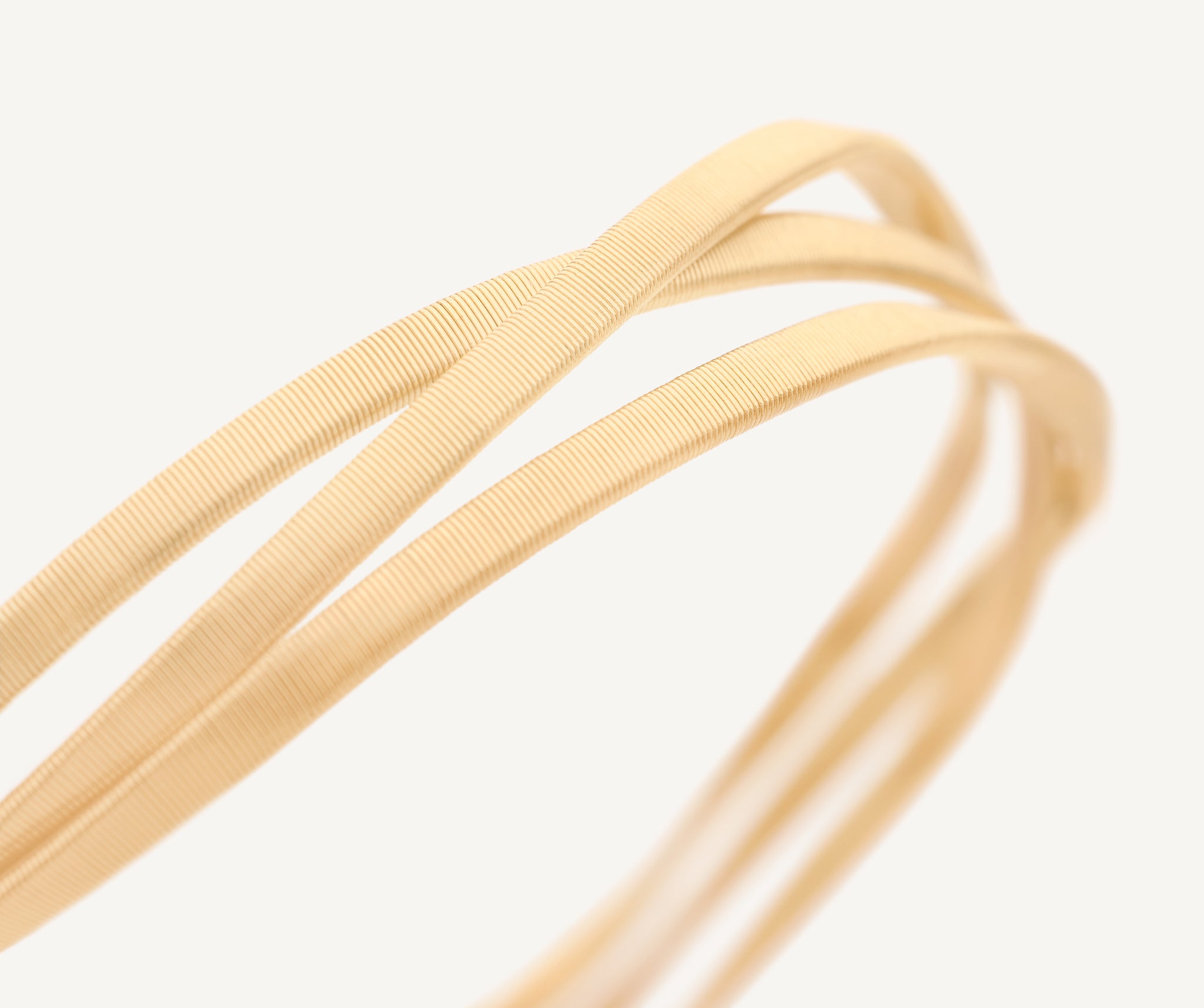 Dreireihiges Armband aus Gelbgold mit 18 Karat – Marco Bicego