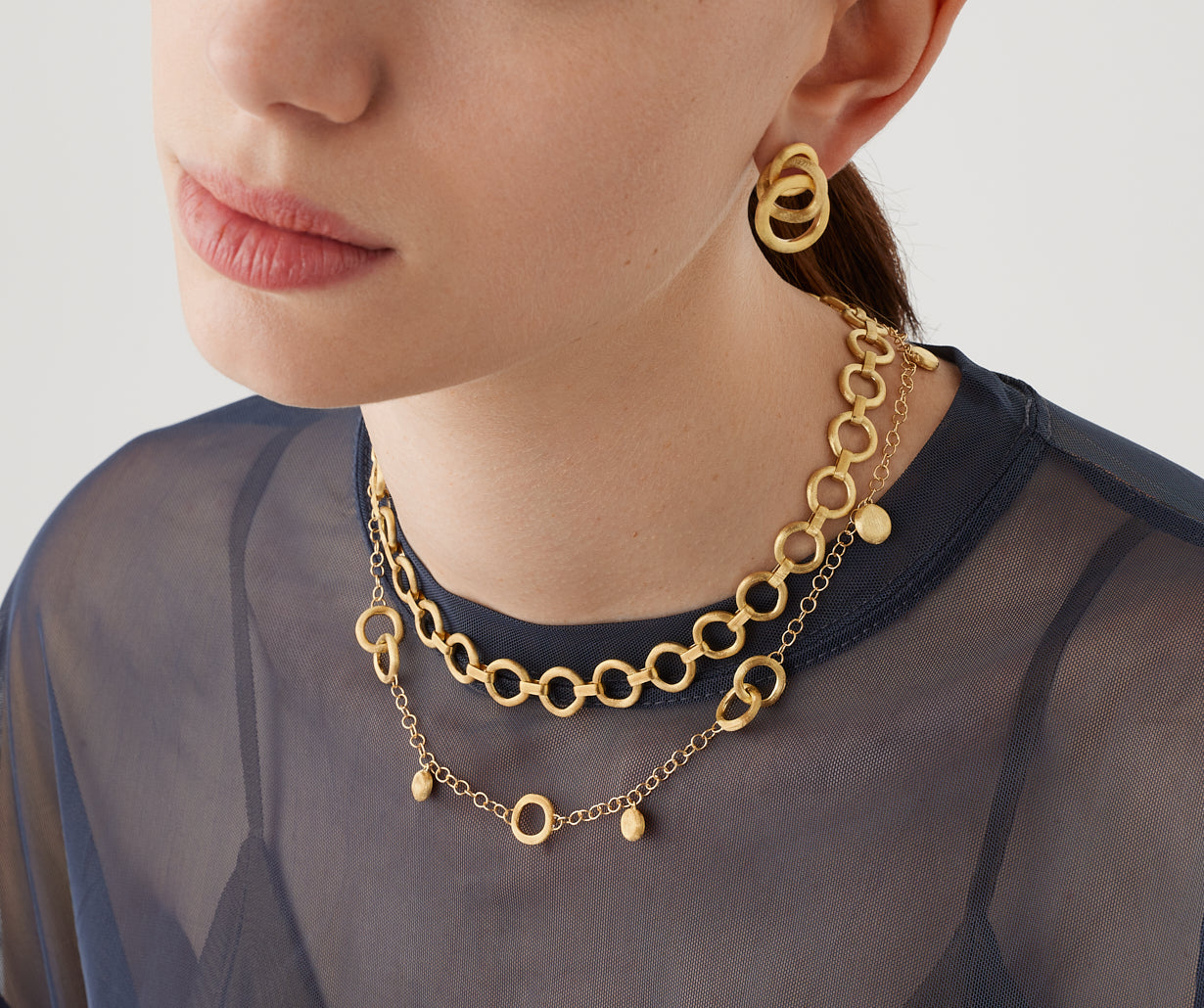 Short gold necklace with charms – Marco Bicego EU