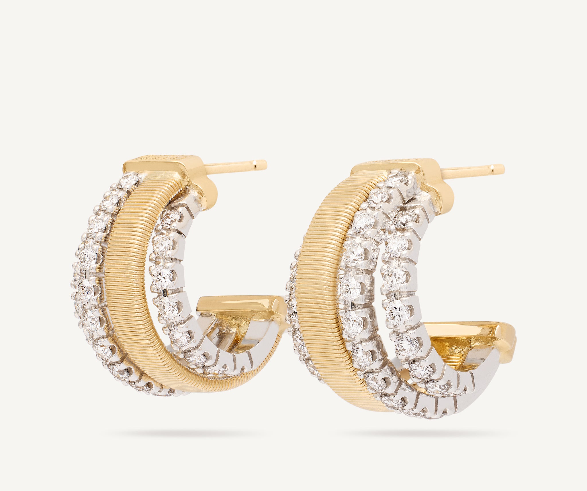 ORECCHINI INFINITO IN ORO GIALLO 18KT CON ZIRCONI BIANCHI TAGLIO BRILLANTE ORECCHINI INFINITO IN ORO GIALLO 18KT CON ZIRCONI BIANCHI TAGLIO BRILLANTE