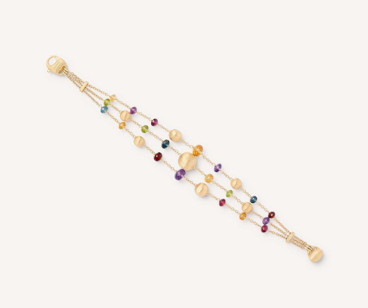 Dreireihiges Armband aus Gold mit bunten Edelsteinen